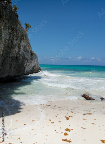 Landscape of a wave against a rock in the Caribbean