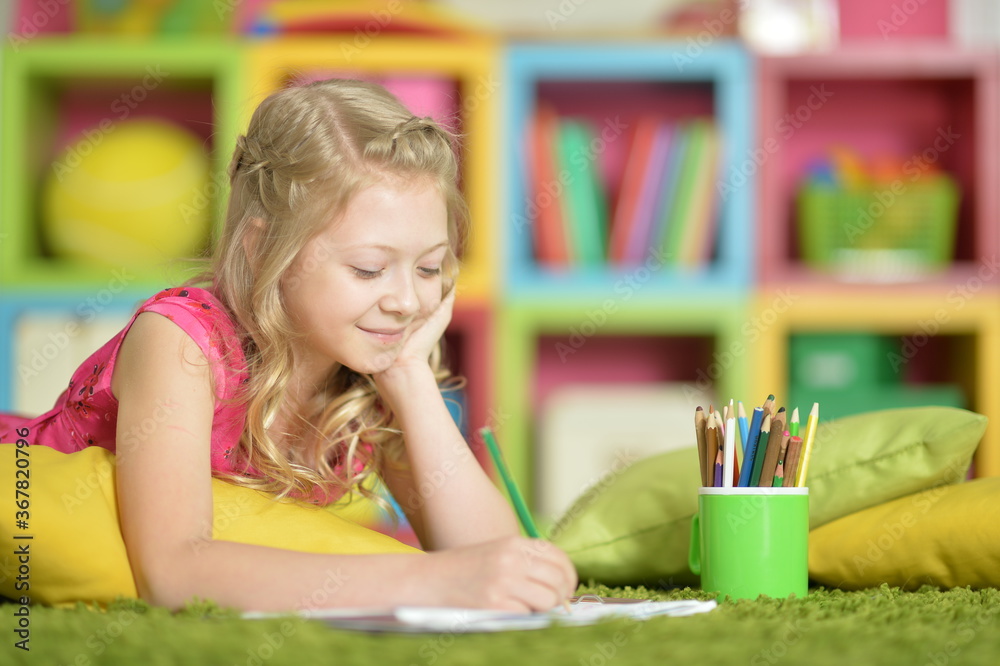 Portrait of beautiful girl drawing picture at home Portrait of beautiful girl drawing picture at home