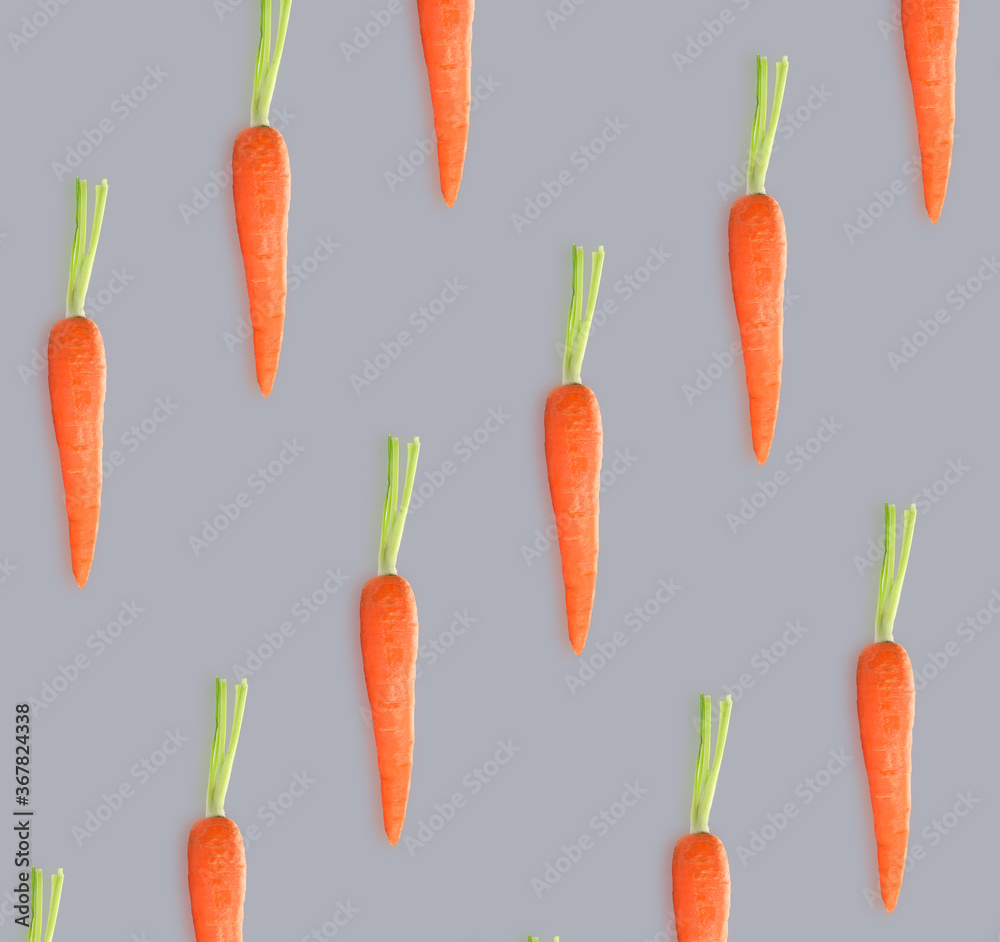 Whole carrots on grey background. Pattern design Whole carrots on grey background. Pattern design