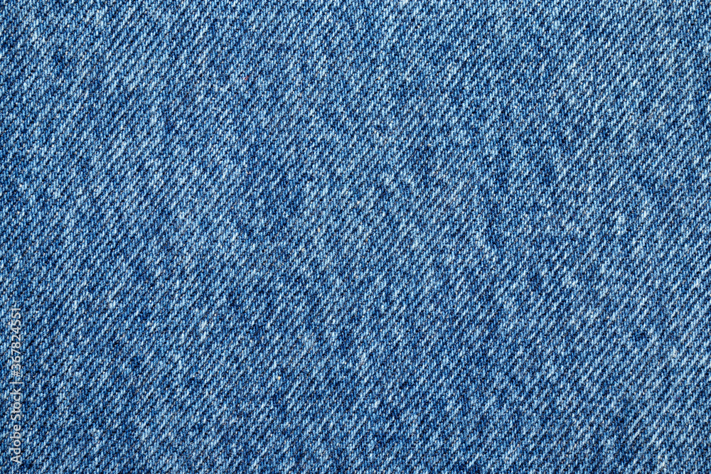 Denim blue jeans texture close up background top view Denim blue jeans texture close up background top view