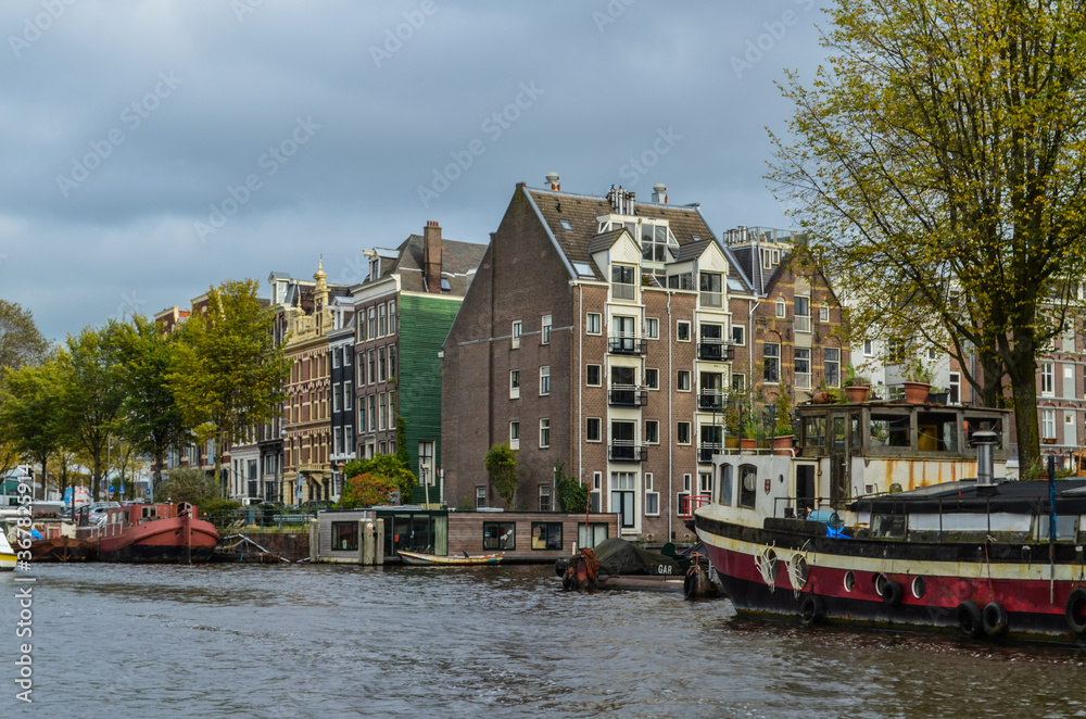 Around the canals of Amsterdam, seeing bridges, buildings, towers and all things of this beautiful city