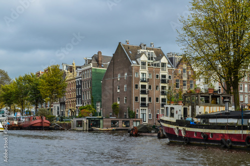 Around the canals of Amsterdam, seeing bridges, buildings, towers and all things of this beautiful city