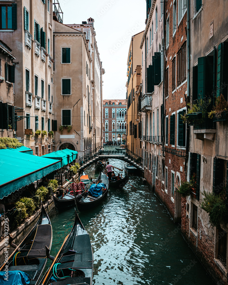 canal in venice italy. gondola in canal