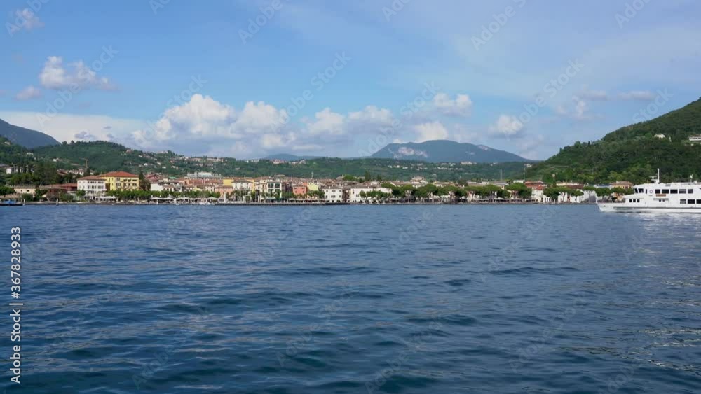 view from the lake on the village of Garda ,on the Lake Garda view from the lake on the village of Garda ,on the Lake Garda