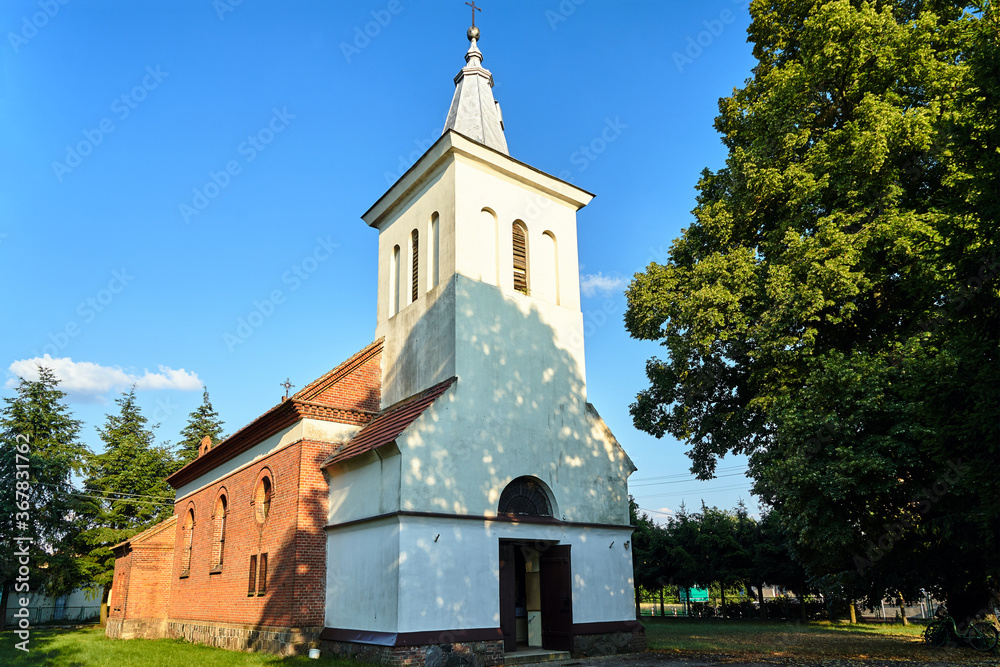 historic parish church with a bell tower in the village of Zemsko