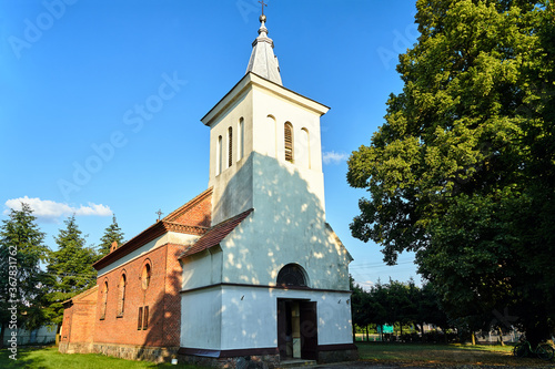 historic parish church with a bell tower in the village of Zemsko