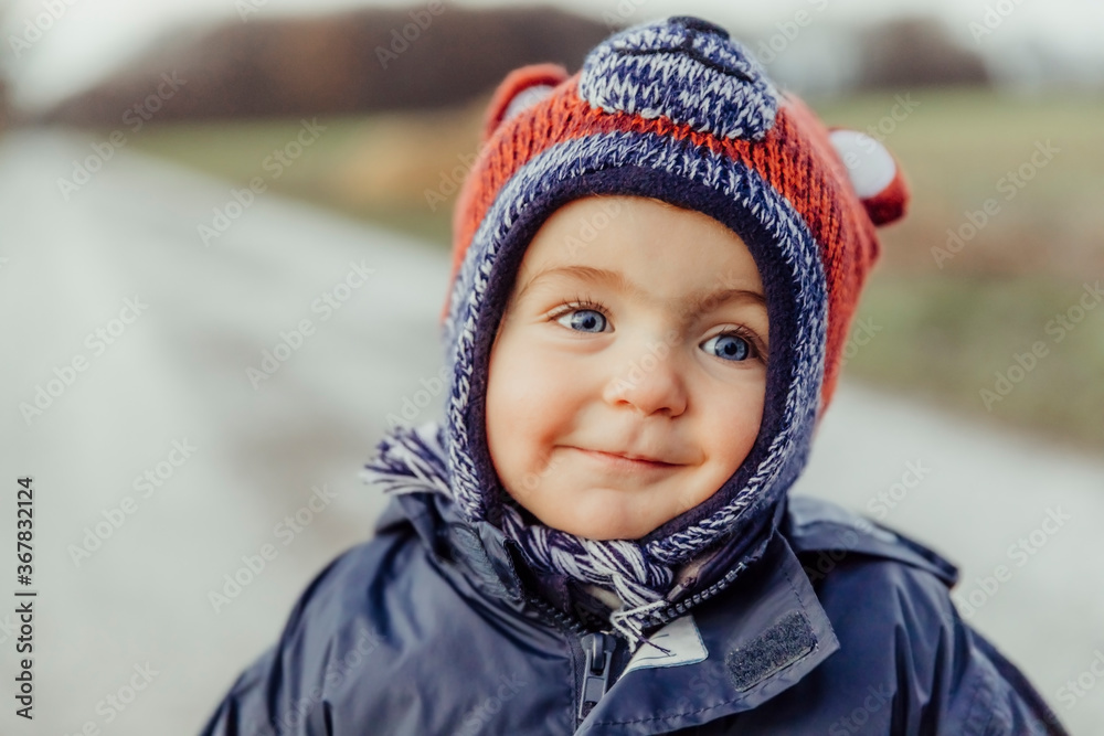 Portrait of a toddler girl with blue eyes