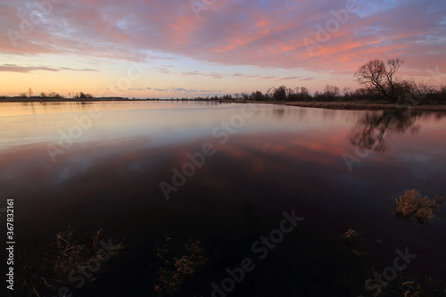 Colorful sunset by the Odra River, Poland.