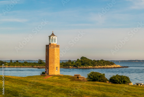 The Avery Point Lighthouse in Groton, Connecticut, on sunset photo