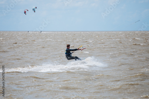Kite surfing on the north sea. Germany. 