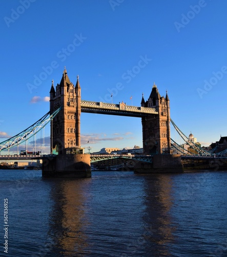 Tower Bridge and Thames River, London, United Kingdom, with clear blue sky