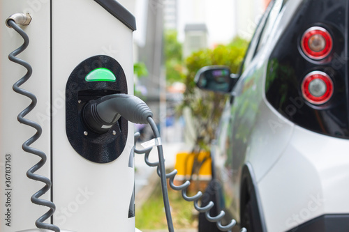Photography Electric car charging station at street level in Singapore, Southeast Asia
