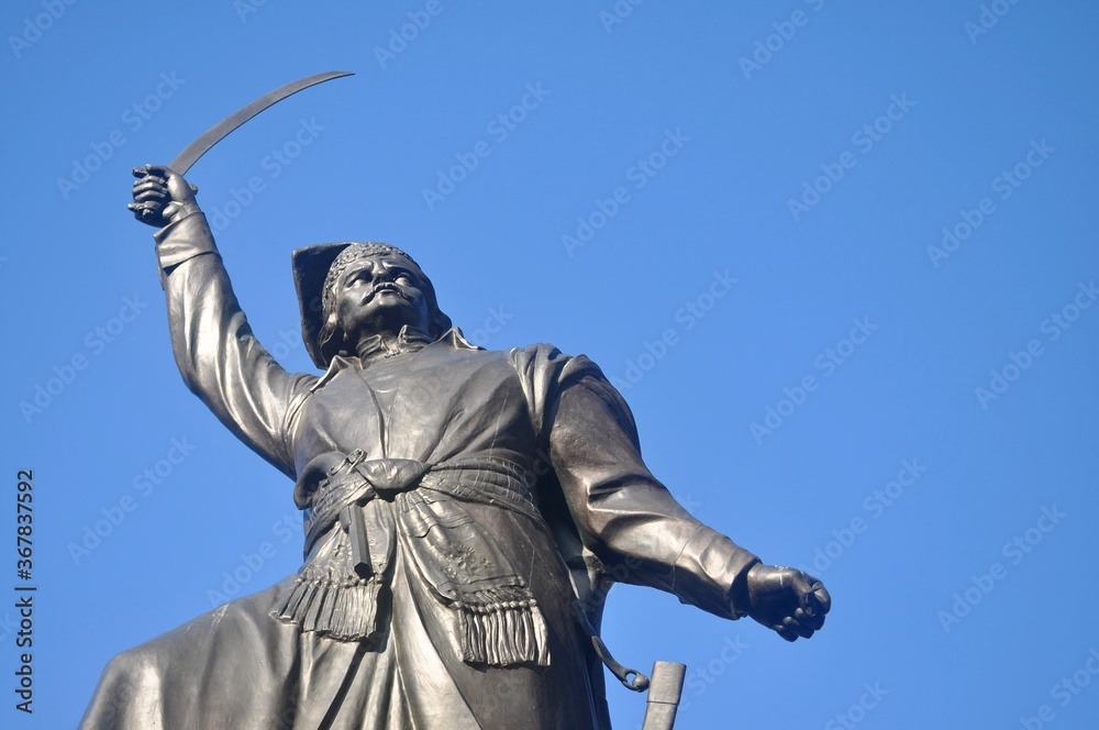 Jan Kiliński monument in Warsaw with blue sky in background. Jan Kiliński monument in Warsaw with blue sky in background.