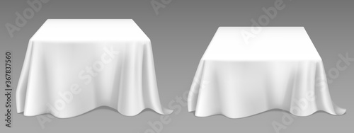 White tablecloth on square tables. Vector realistic mockup of empty dining desk with blank linen cloth with drapes for banquet restaurant, holiday event or dinner. Template with fabric cover