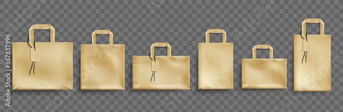 Craft paper eco bags different shapes with tags. Vector realistic mockup of blank brown packets with handles isolated on transparent background. Template for corporate design on cardboard bag