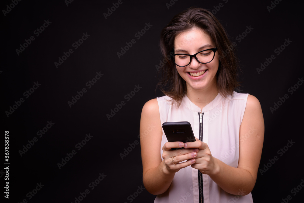 Portrait of young beautiful businesswoman with short hair