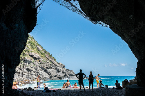 beach and sea seen from a cave in vernazza in the Cinque Terre