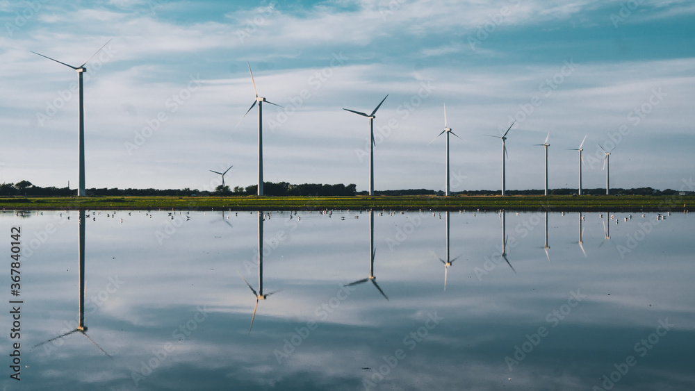 Fototapeta premium Reflective windmills - The netherlands