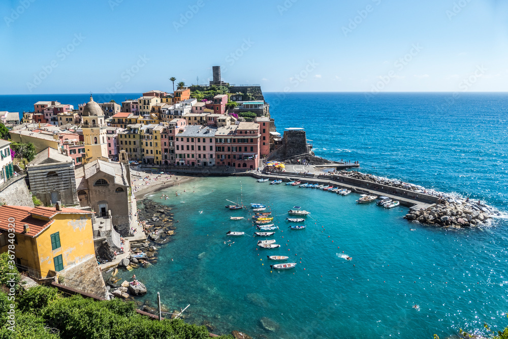 aerial view of Vernazza in the Cinque Terre with colorful houses and flowers