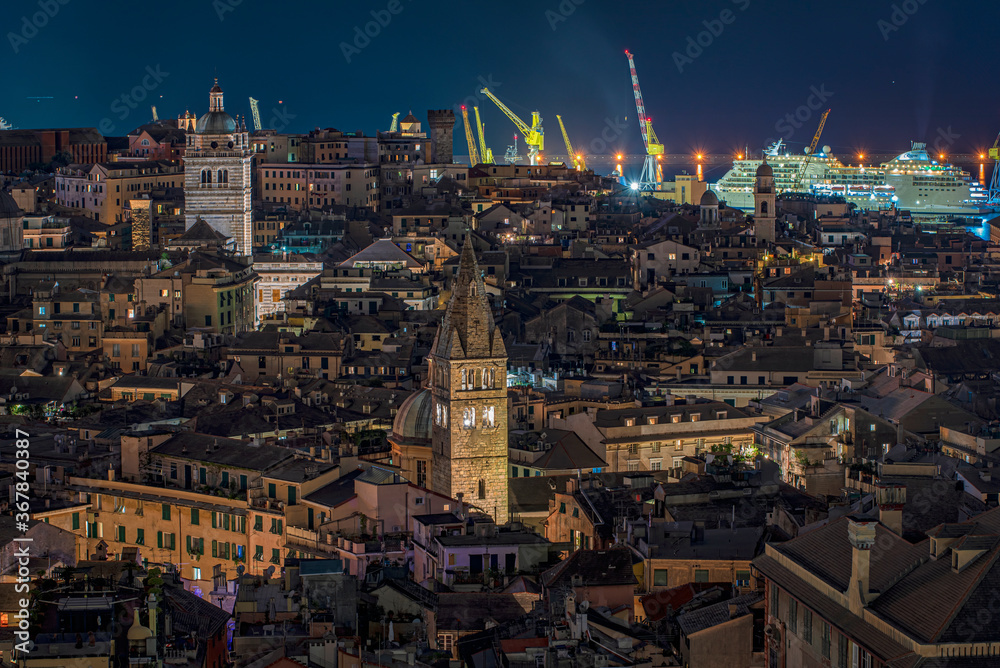 Aerial view of Genoa at night looking to the Port