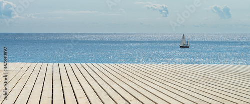 Принти на полотні Banner Wooden background and sunny sea with boat