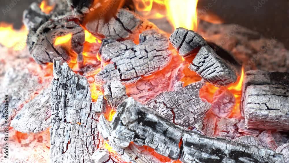 close-up. flames on burning wood in barbecue. close-up. flames on burning wood in barbecue.