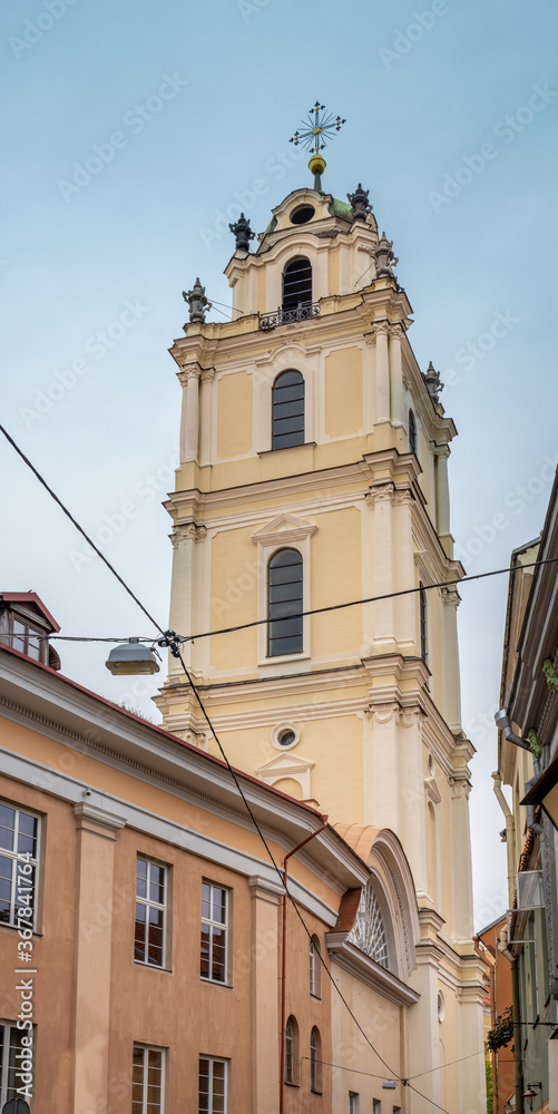 Fototapeta premium The Church of St. Johns, St. John the Baptist and St. John the Apostle and Evangelist, Old Town of Vilnius, Lithuania and dominates the university (ensemble.
