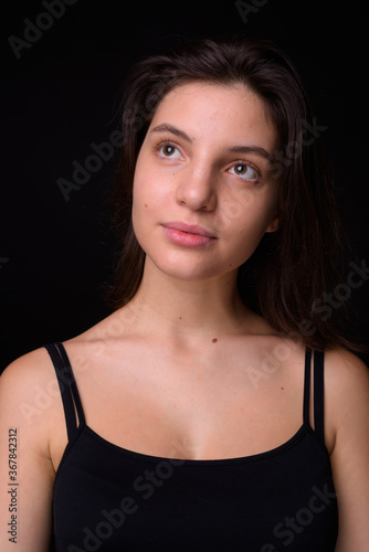 Portrait of young beautiful woman with short hair