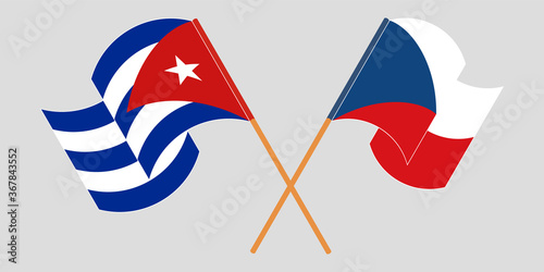 Crossed and waving flags of Cuba and Czech Republic