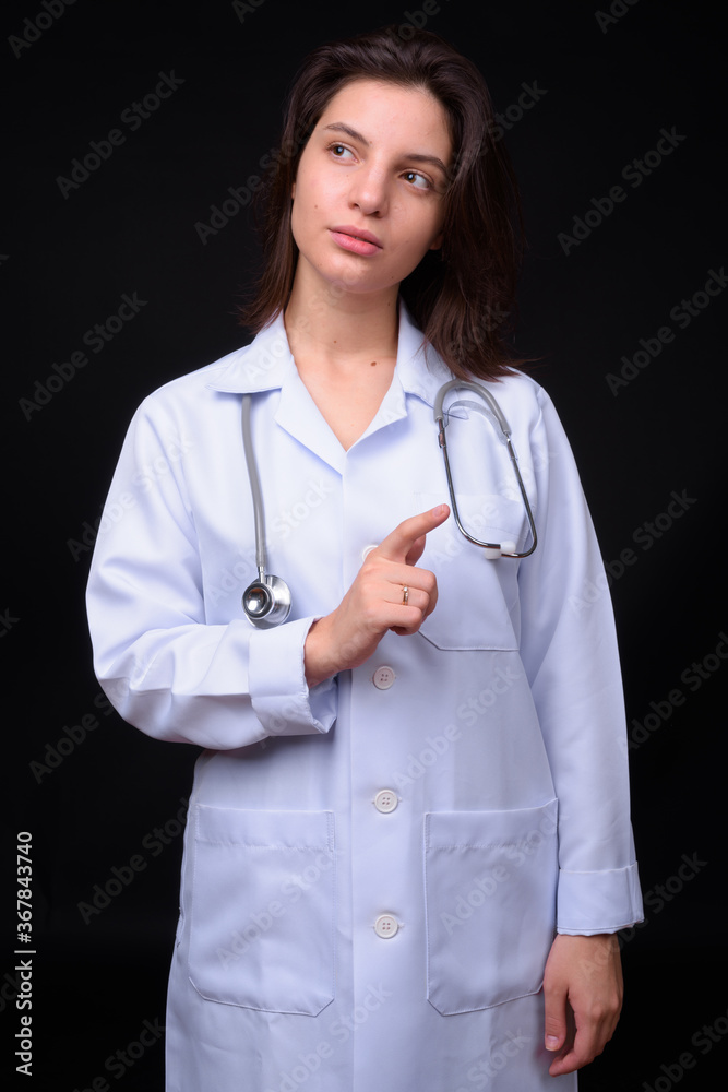 Portrait of young beautiful woman doctor with short hair Portrait of young beautiful woman doctor with short hair