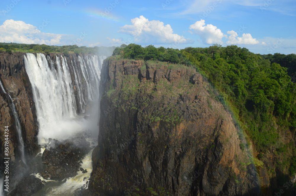 The massive Victoria Falls waterfalls between Zimbabwe and Zambia in Southern Africa The massive Victoria Falls waterfalls between Zimbabwe and Zambia in Southern Africa