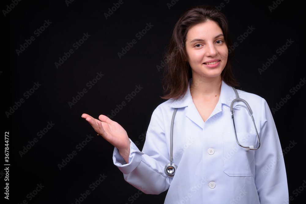 Portrait of young beautiful woman doctor with short hair Portrait of young beautiful woman doctor with short hair