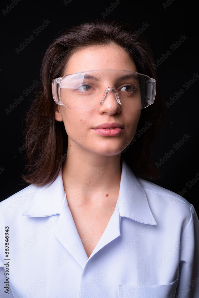 Portrait of young beautiful woman doctor with short hair Portrait of young beautiful woman doctor with short hair