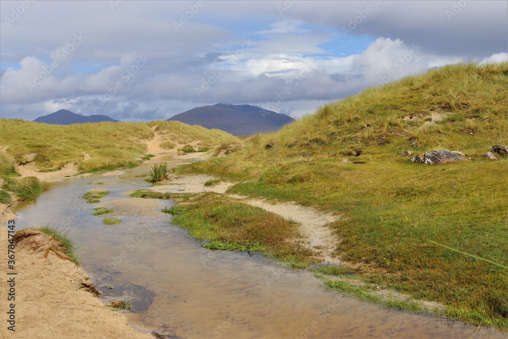 landscape with river and mountains, outer hebrides, scotland