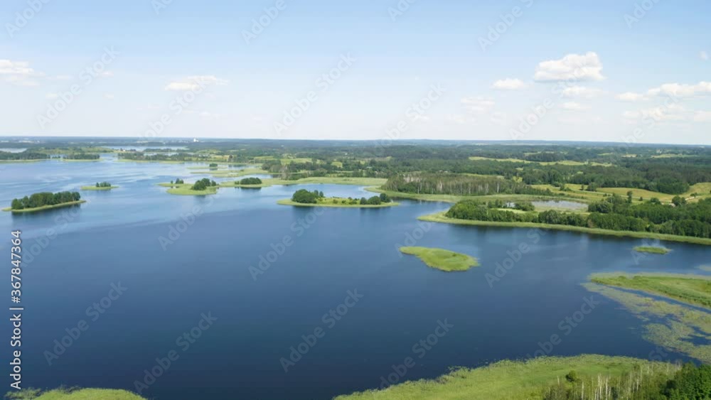 Drone shot on summer lake. Aerial view of summr landscape lake.
Drone shot on summer lake. Aerial view of summr landscape lake.