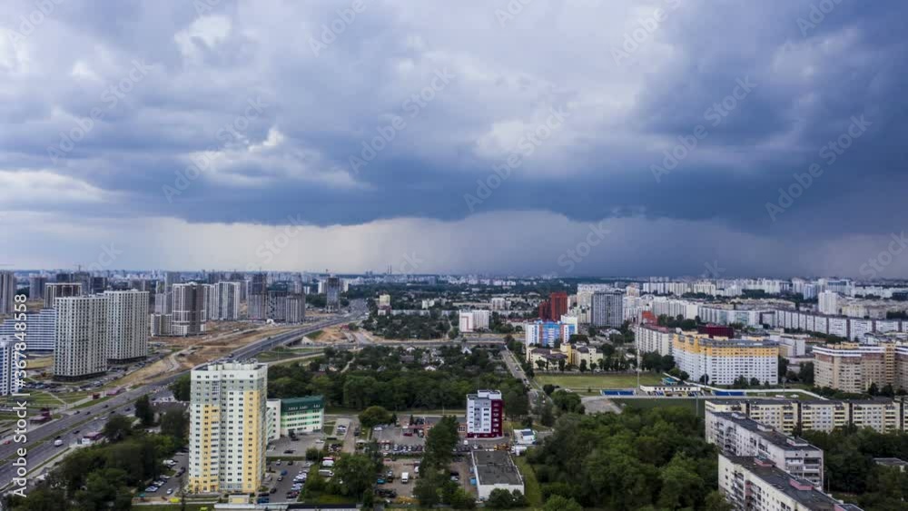 Storm clouds over city, aerial view, hyper lapse.
Storm clouds over city, aerial view, hyper lapse.