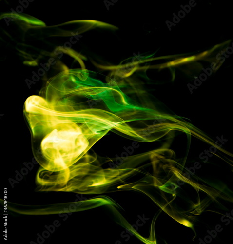 Colored smoke on black background