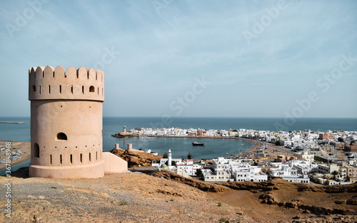 Picture of a small tower on the top of a hill overlooking Al Ayjah, in Oman. photo