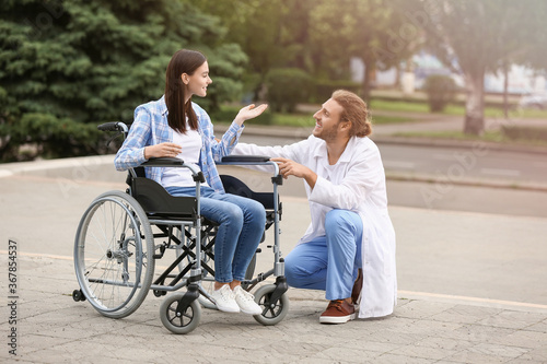 Doctor and young woman in w...