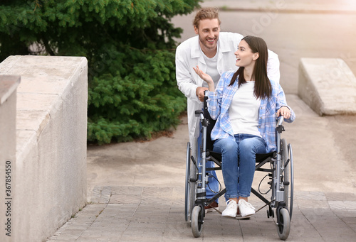 Doctor and young woman in w...
