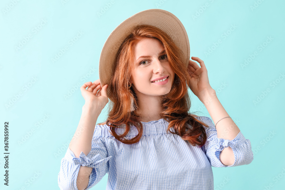 Beautiful young redhead woman on color background Beautiful young redhead woman on color background