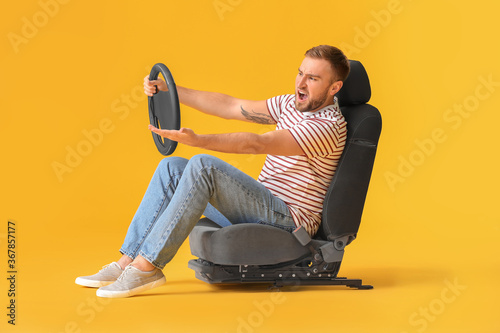 Displeased man with steerin...