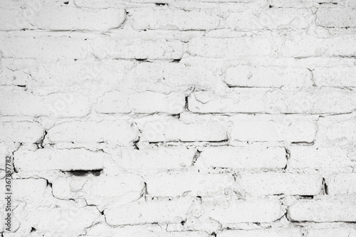 Wall texture of cement and white bricks. Sloppy construction works abstract background