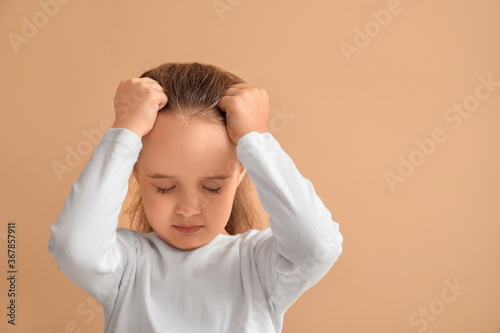 Sad little girl with autist...