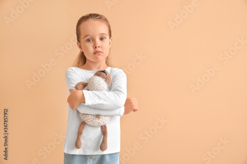 Sad little girl with autist...