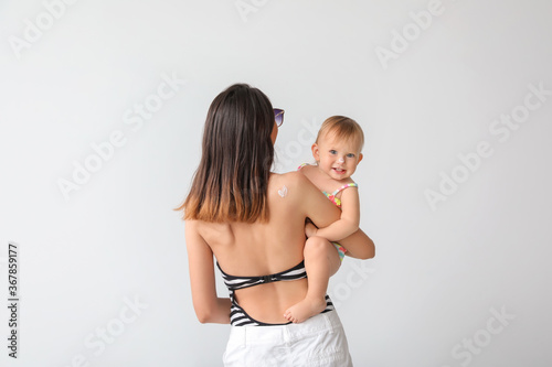 Mother and her little daugh...