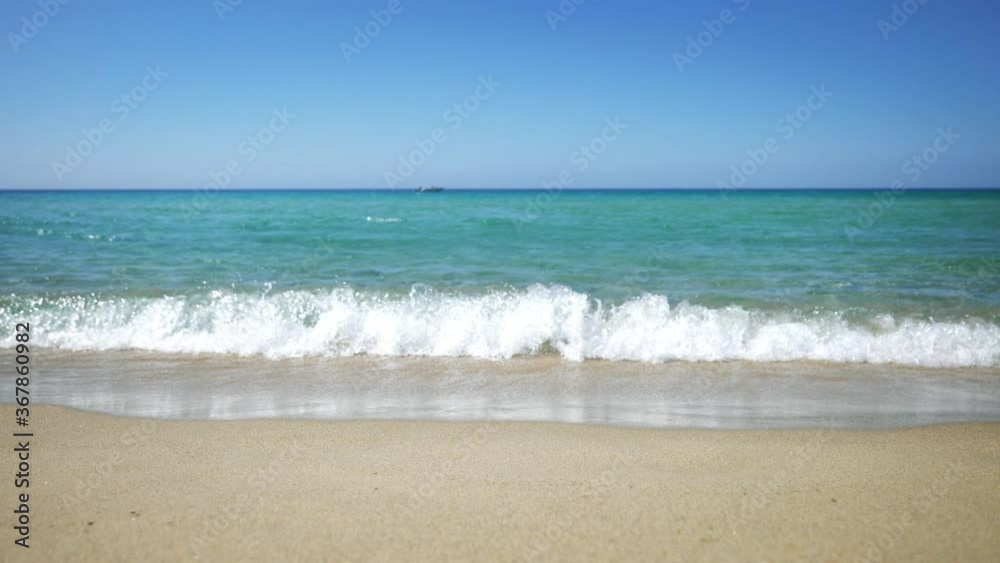 Slow motion of scenic panoramic view of the seascape with idyllic waves in summer on a hot sunny day. Slow motion of scenic panoramic view of the seascape with idyllic waves in summer on a hot sunny day.