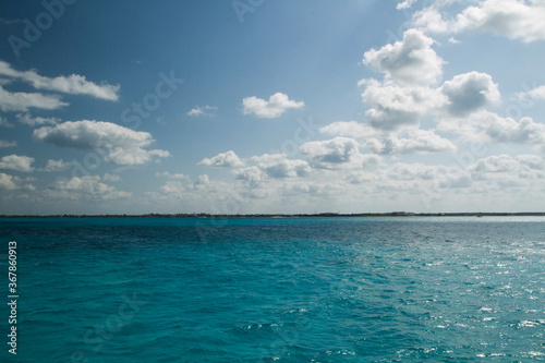Vacations. Seascape. View of the turquoise color water ocean, sea waves and horizon in the Caribbean.