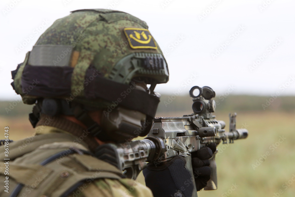 Pistol, small arms close-up in the hands of a policeman. Pistol, small arms close-up in the hands of a policeman.