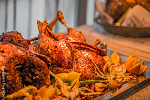 Grilled spicy whole chicken in buffet  photo